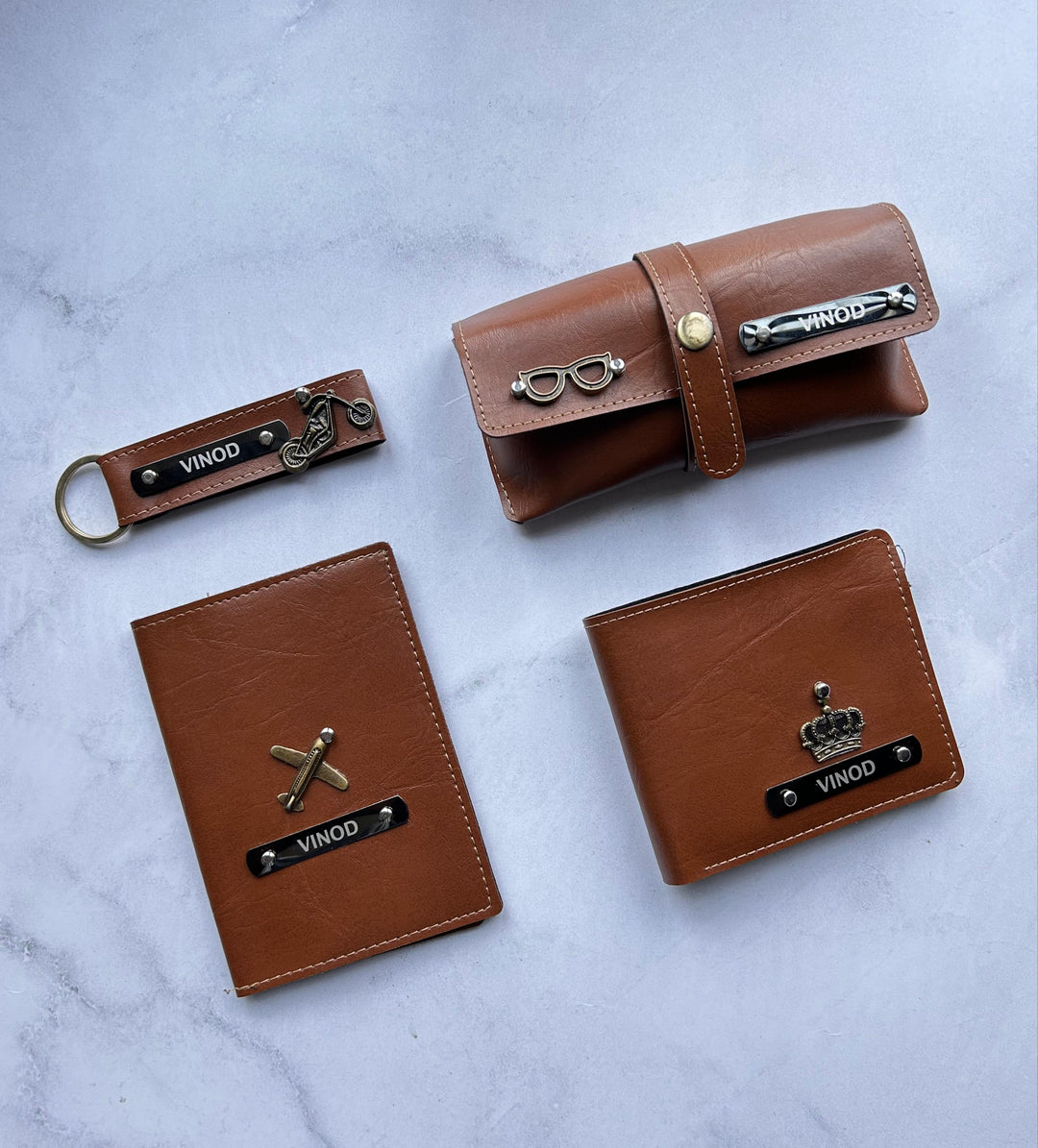 Essential travel items in one set: Wallet, Passport Cover, Keychain, and Name Tag | Zestpics